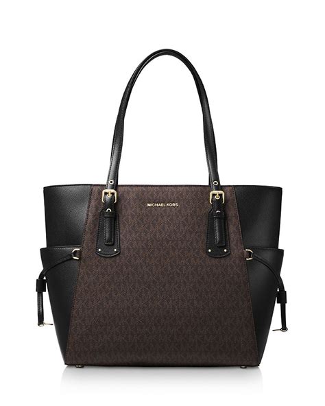 michael kors voyager east west tote brown|michael kors tote with zipper.